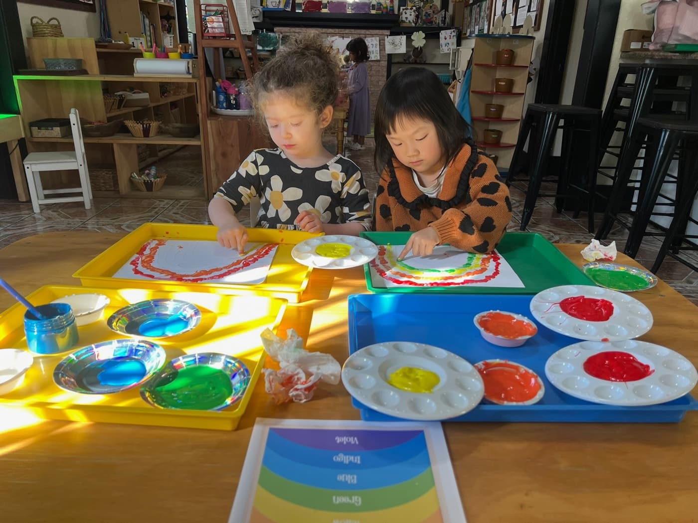 Painting rainbows with dot-stamped colors