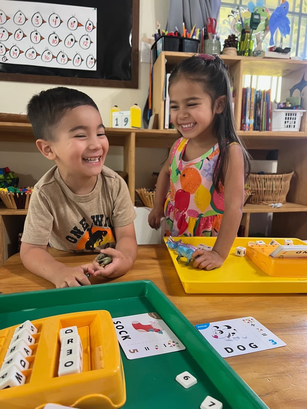 Sharing giggles over a letter-matching game